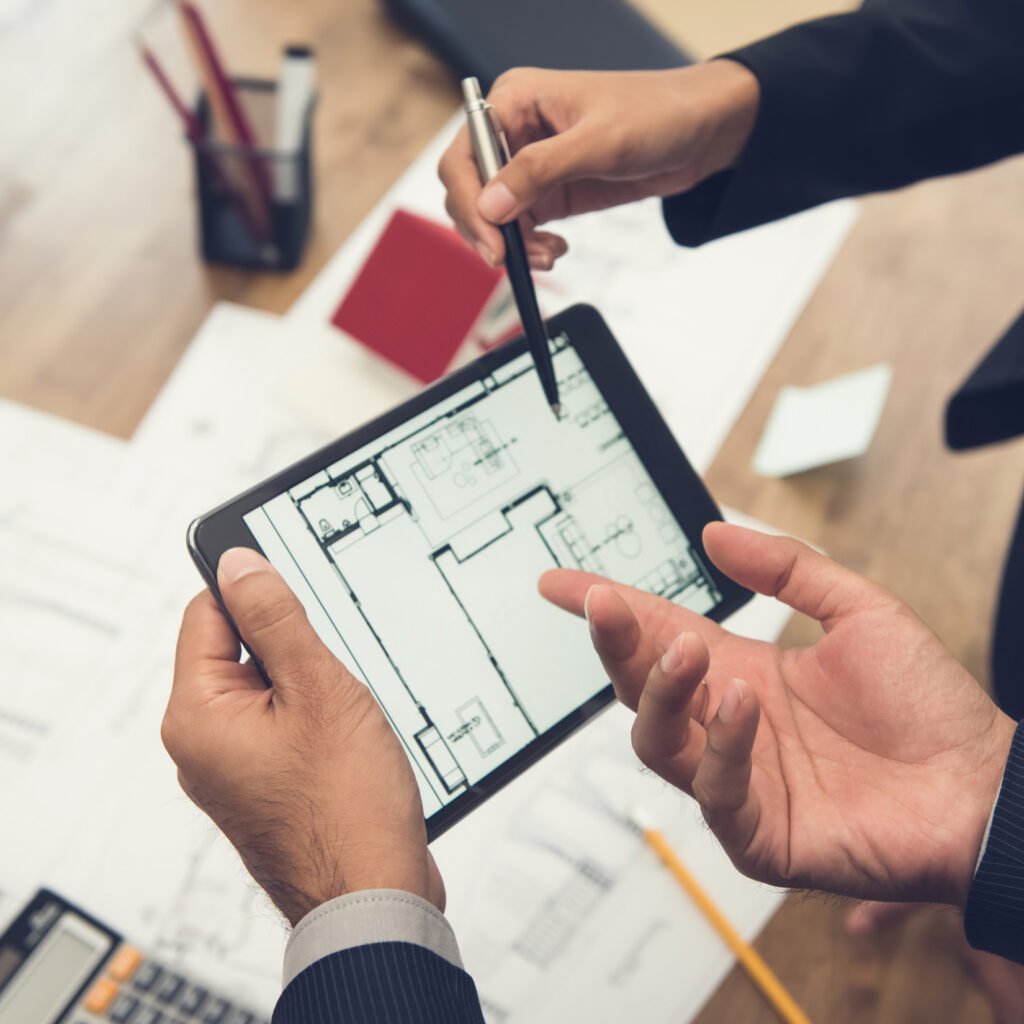 Looking at floor plan on tablet device. Cerebral Security Solutions. Security Guarding, Door Supervisors, Hotel Security, Keyholding, Mobile Security, Vacant Property Security, Farm Security, Education Security. Bristol, Somerset.